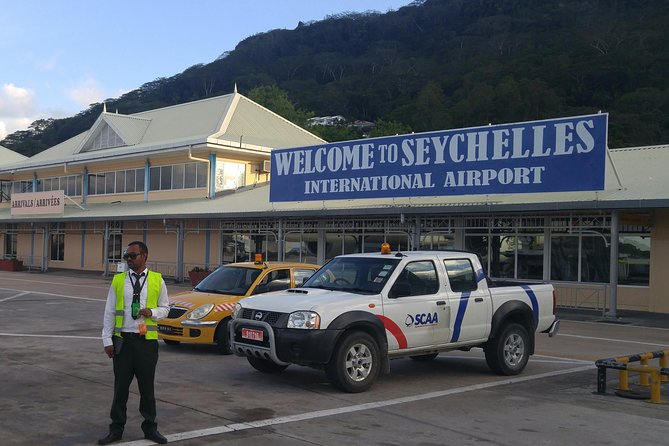 Private ARRIVAL Transfer from Seychelles Airport to any Hotels in Mahe - Meeting Your Driver in Victoria, With a Vision Voyages DMC Hostess